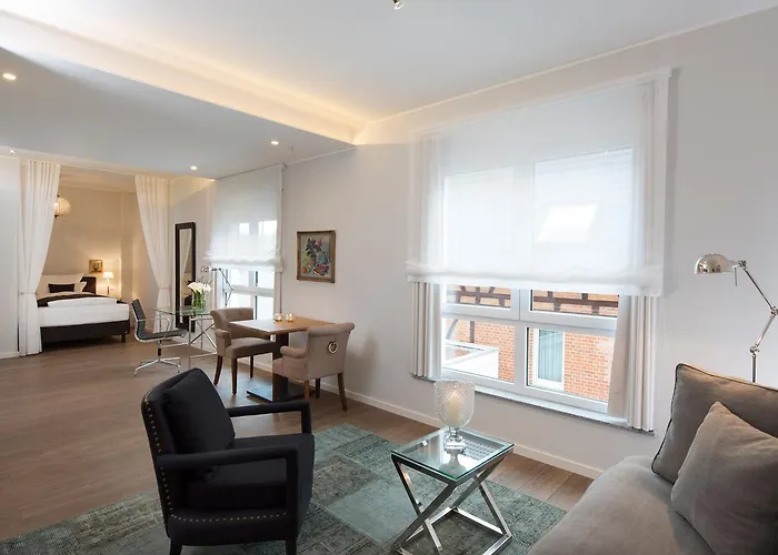 Апарт-отель Logis First Class Business Suites Реннинген