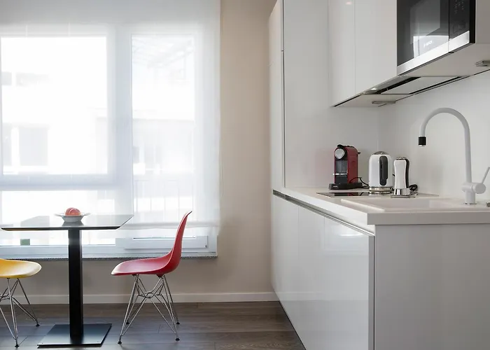 Апарт-отель Logis First Class Business Suites Реннинген