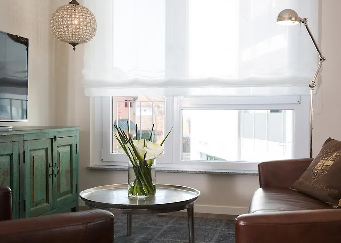 Logis First Class Business Suites Апарт-отель Реннинген