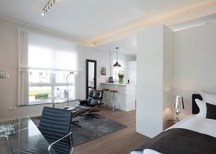 Logis First Class Business Suites Апарт-отель Реннинген